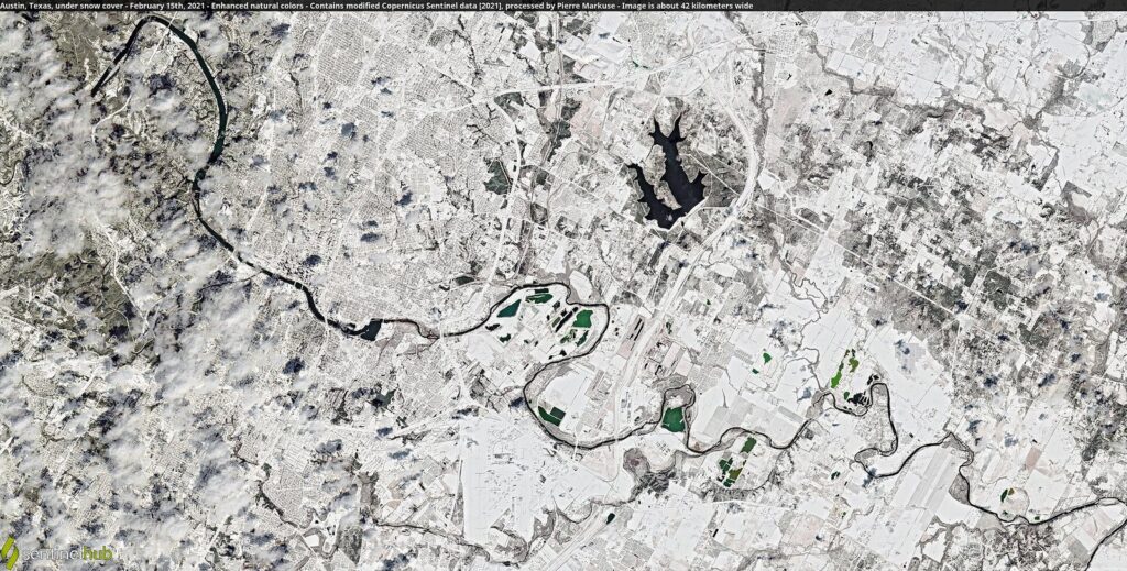 Satellite view of Austin and the Colorado River under snow cover on February 15, 2021