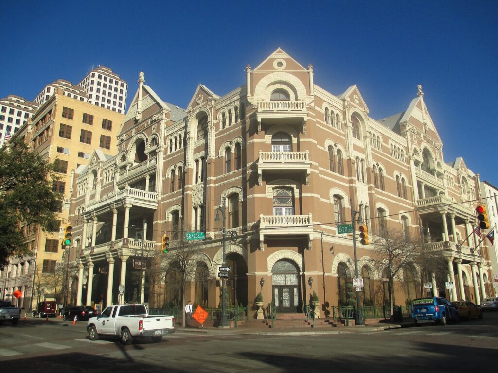 The Driskill Hotel's ornate Romanesque facade at Sixth and Brazos streets in downtown Austin